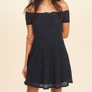 Scalloped off the shoulder dress in navy blue